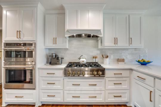 white cabinets with gold hardware