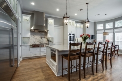 home improvements that pay off - gray and white kitchen remodel