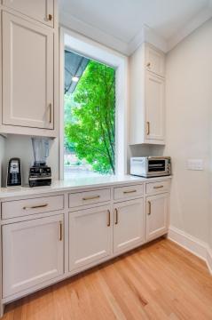 white cabinetry with gold hardware