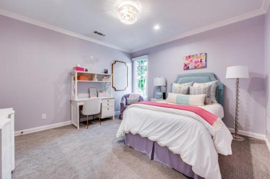 bedroom with purple walls