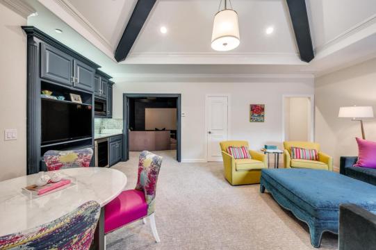 sitting area with colorful chairs