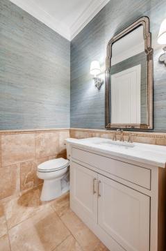 powder room with white vanity and white countertop