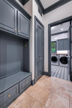 mudroom with navy cabinetry