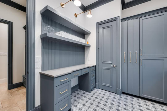 mudroom with tile flooring