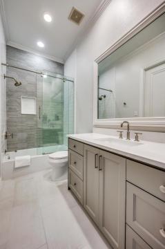 gray bathroom vanity with white countertop