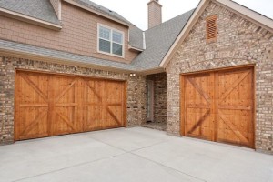 Upgrade Your Garage - Stained wood garage doors