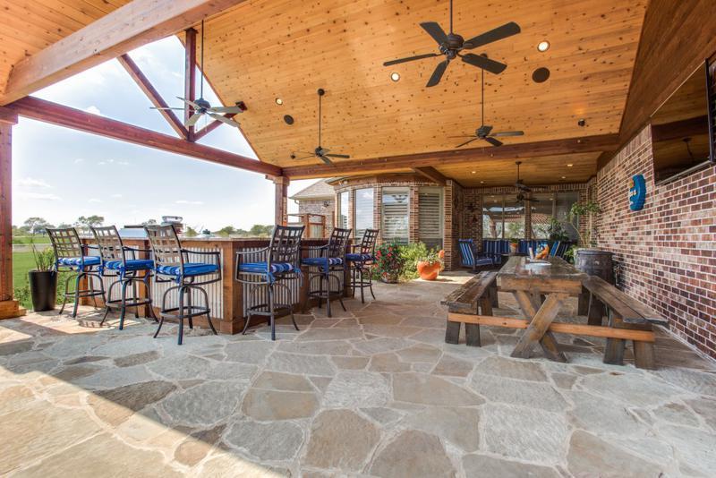 Outdoor Entertainment - outdoor kitchen and living area under patio cover