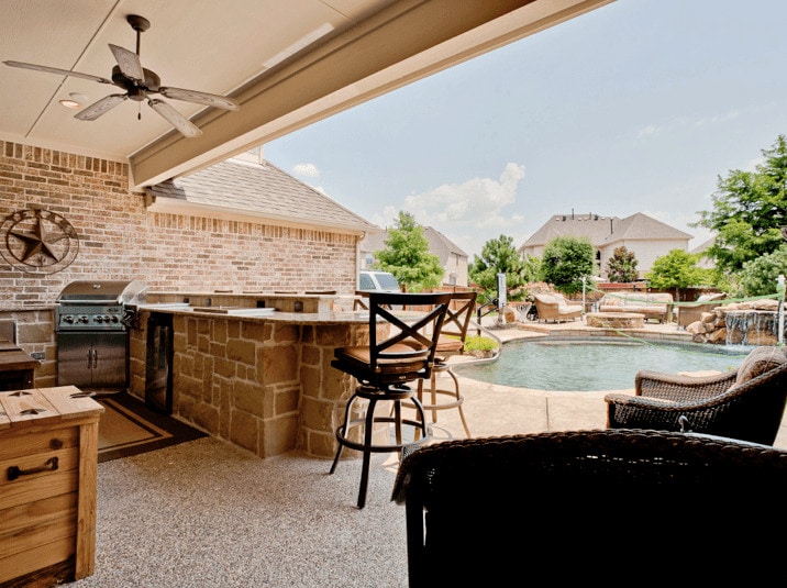 Outdoor Entertainment - outdoor living space with kitchen and pool