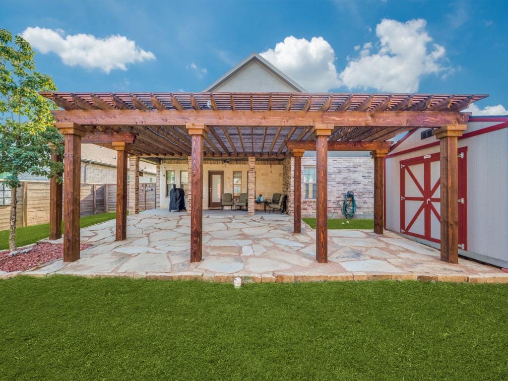 create an outdoor living room with a patio cover or pergola