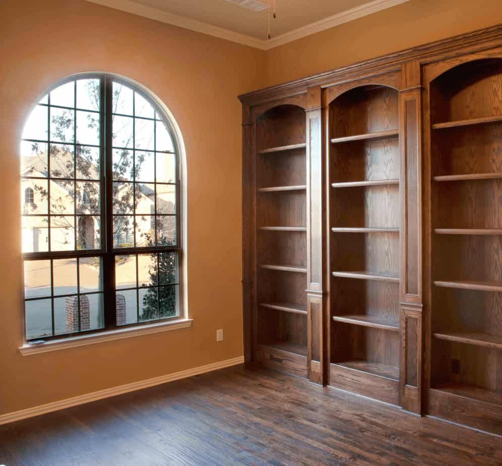 Wood built-in bookcase after insurance restoration