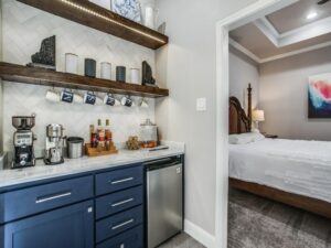 multi-gen living - master suite with coffee bar