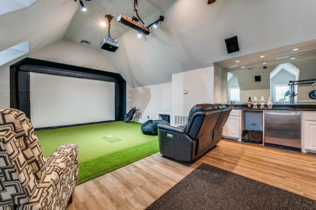 room addition with a golf simulator - quality home remodeling