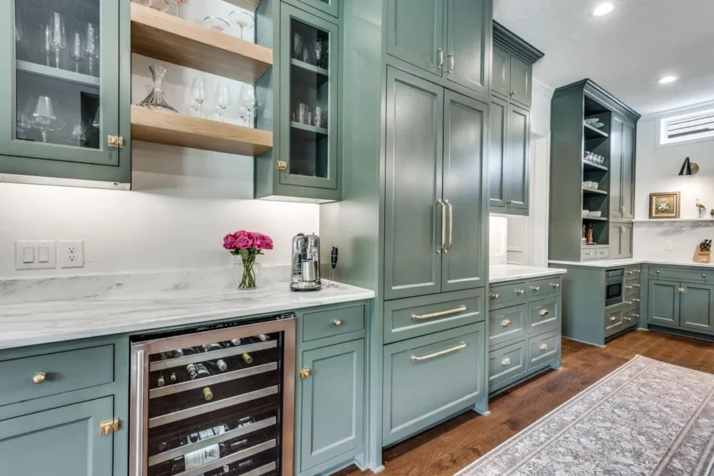kitchen with green cabinetry - quality home remodeling