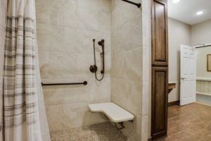 aging in place features - shower with seat and handle bars