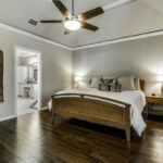 master bedroom design - neutral master bedroom with wood details